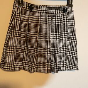 Wrap Front Pleated Skirt. No manufacturer’s label.